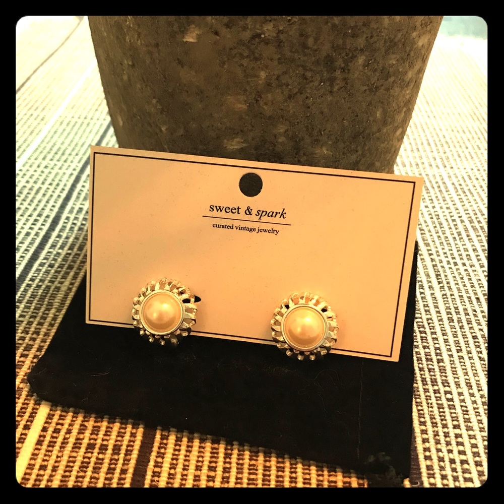 Pair of vintage sweet and spark clip on earrings